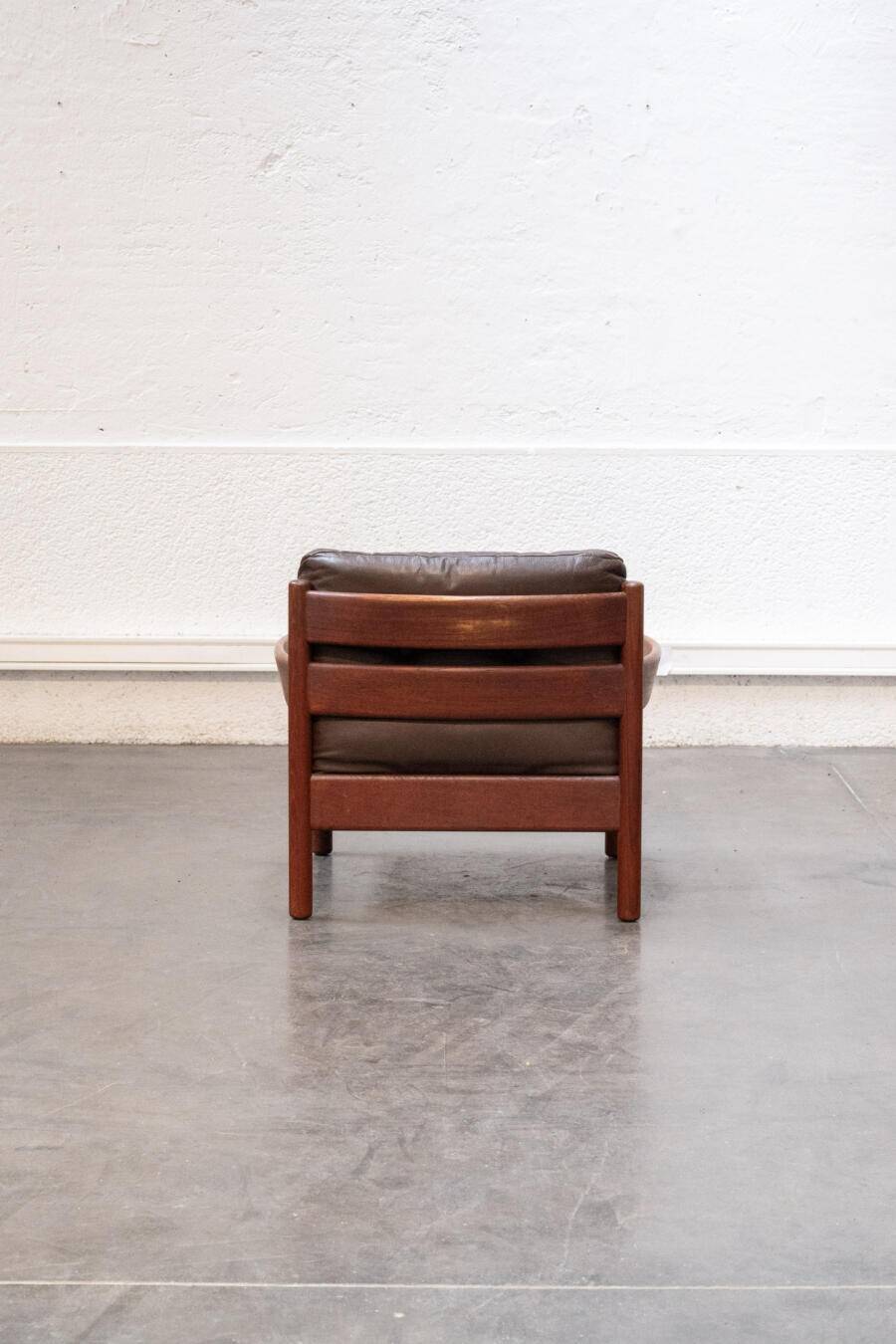 Teak and leather armchair
