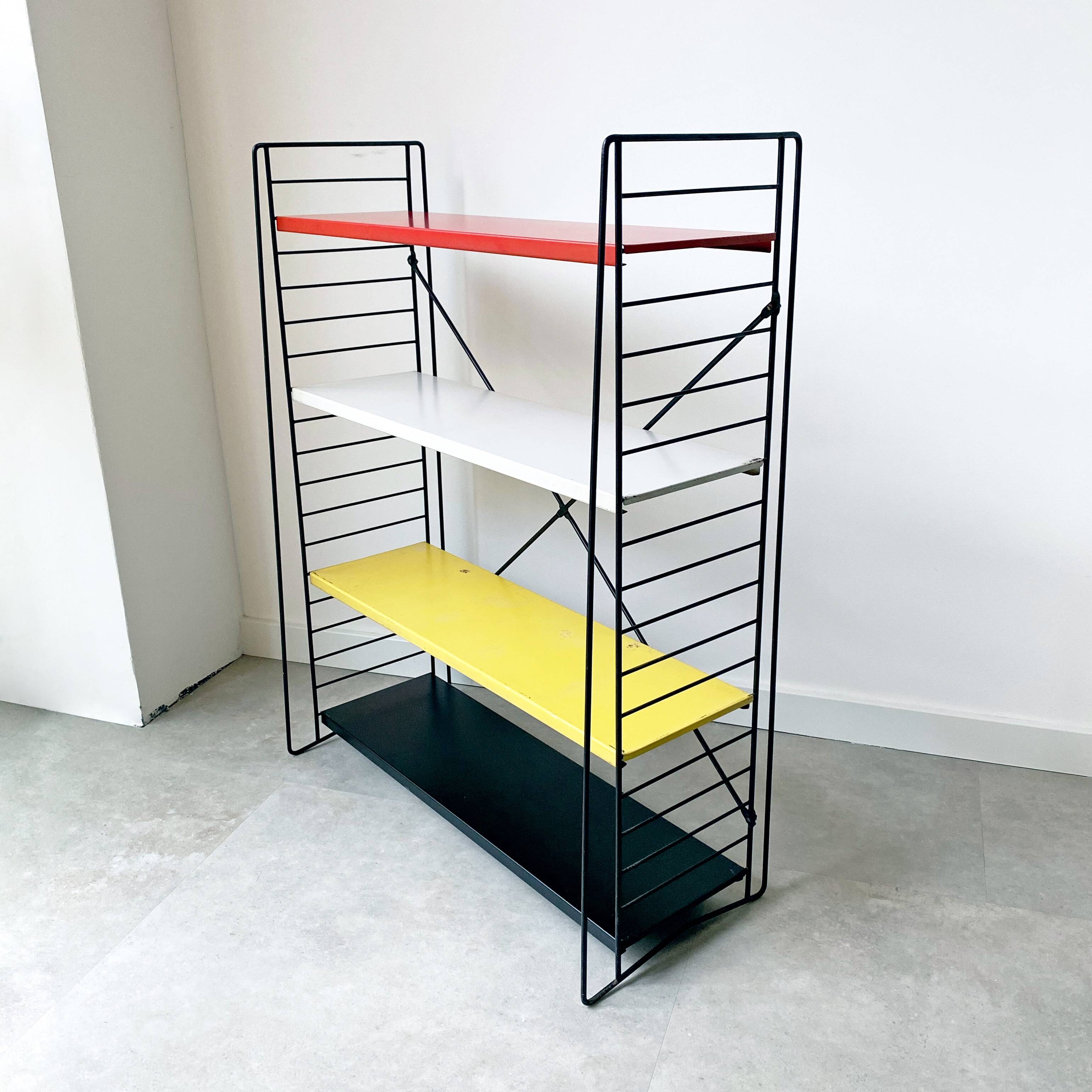 Mid century free standing tomado shelving system / bookcase designed by d. dekker