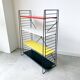 Mid century free standing tomado shelving system / bookcase designed by d. dekker