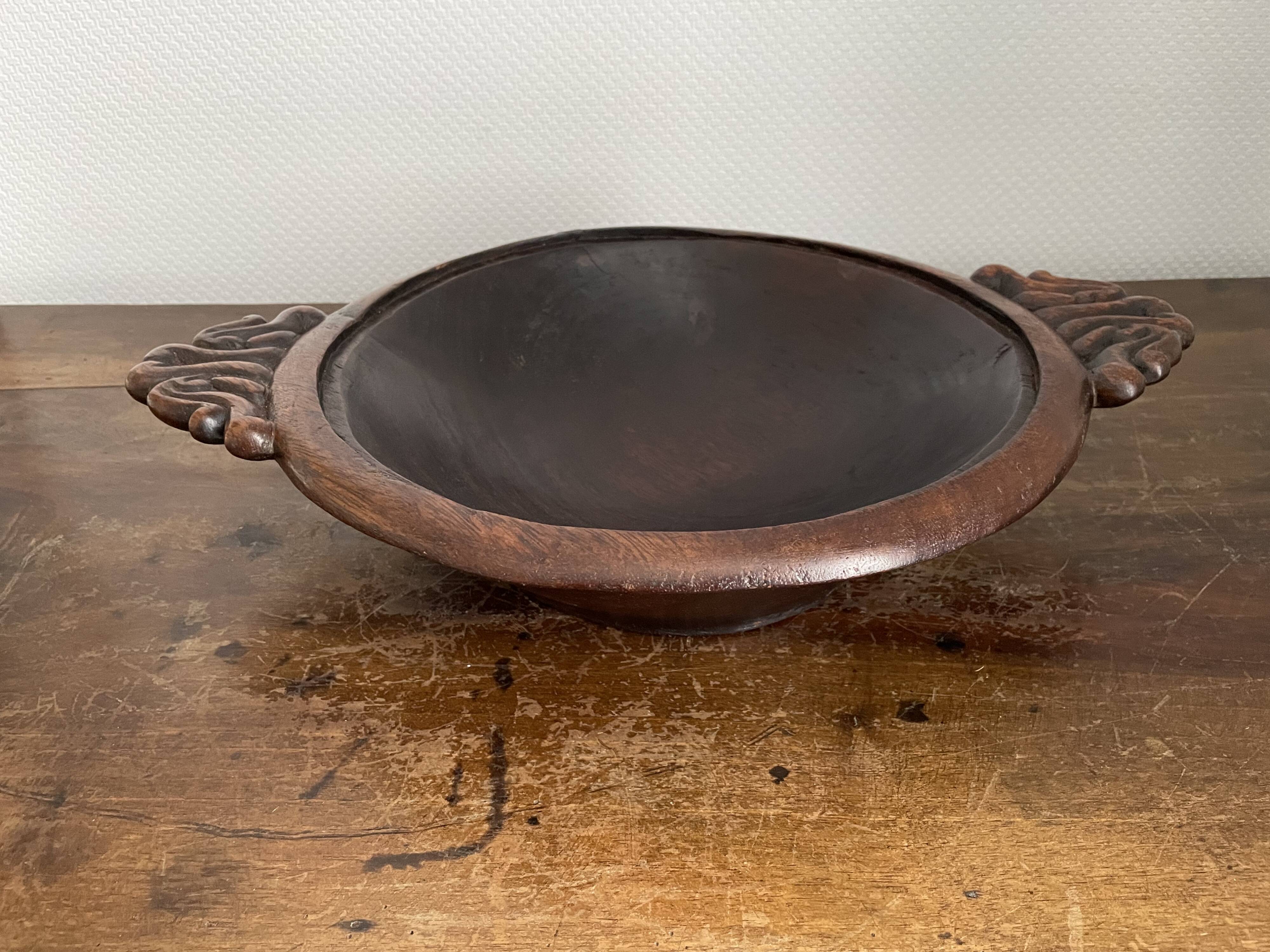 Hollow carved wooden dish