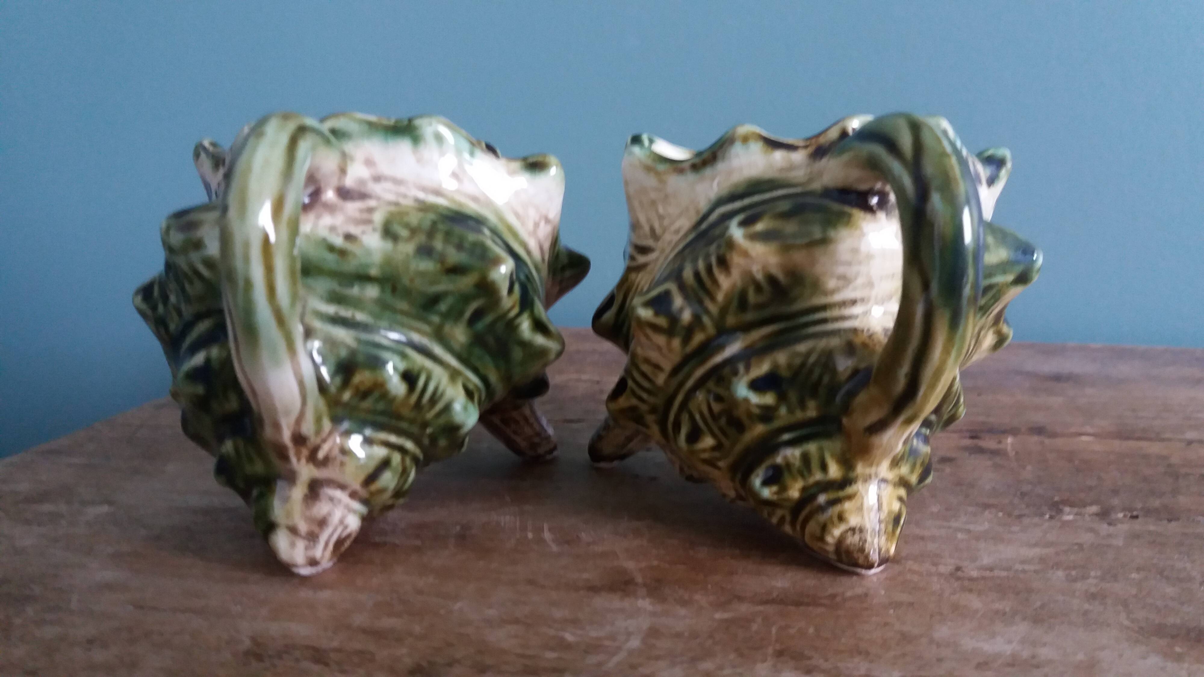 Animal-shaped milk jug shell in slipware.