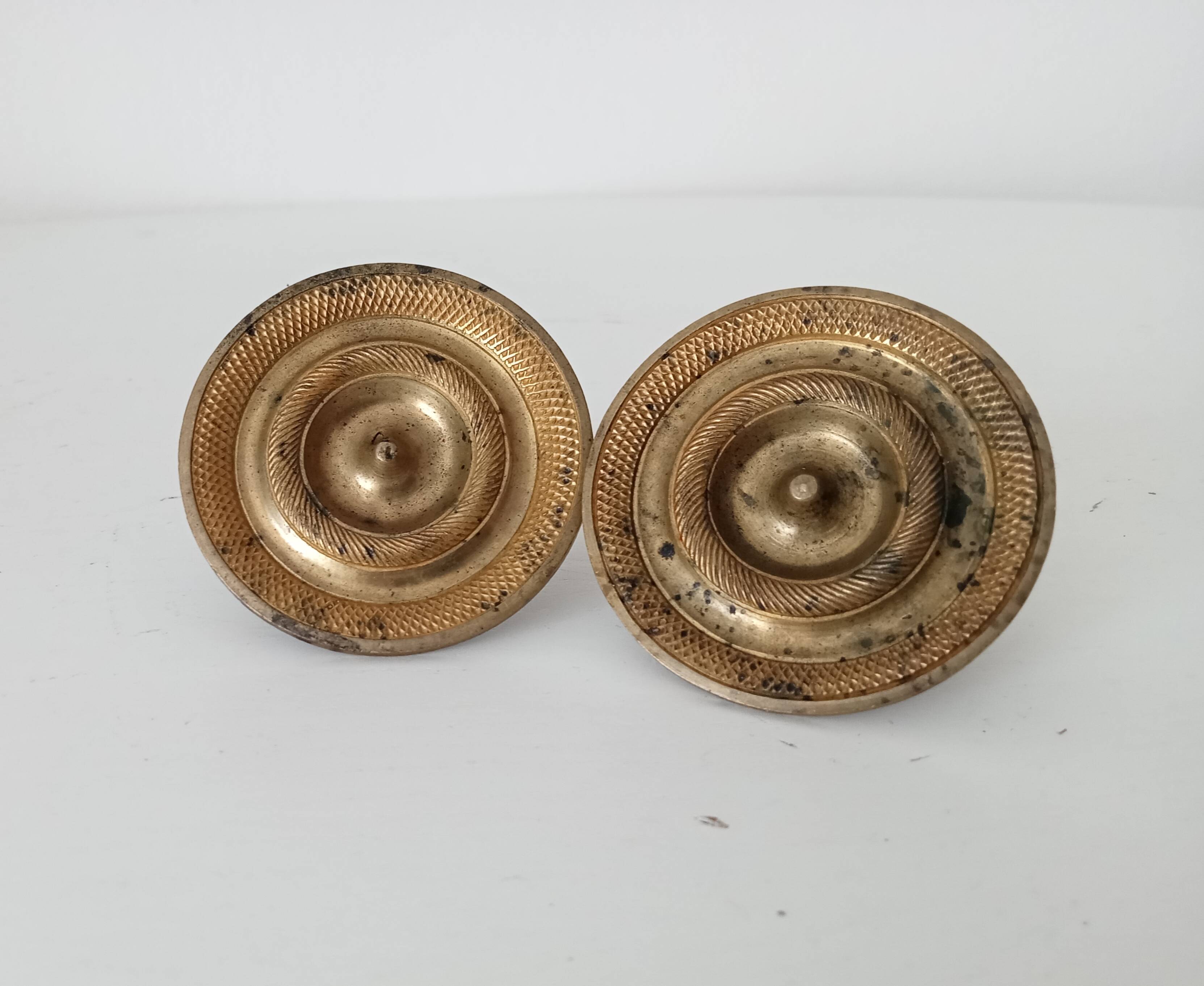 Pair of antique Empire furniture knobs from the 19th century in gilded bronze.