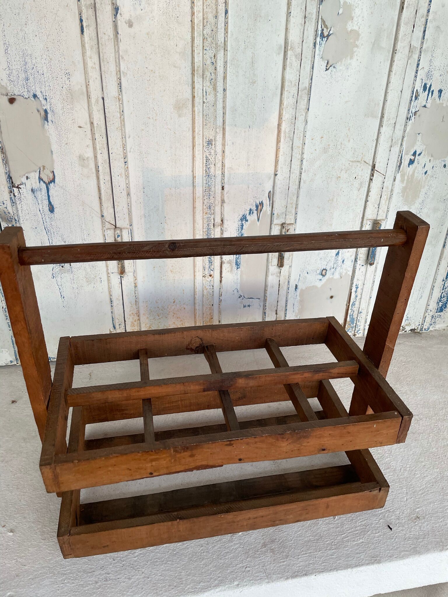 Old wooden bottle holder