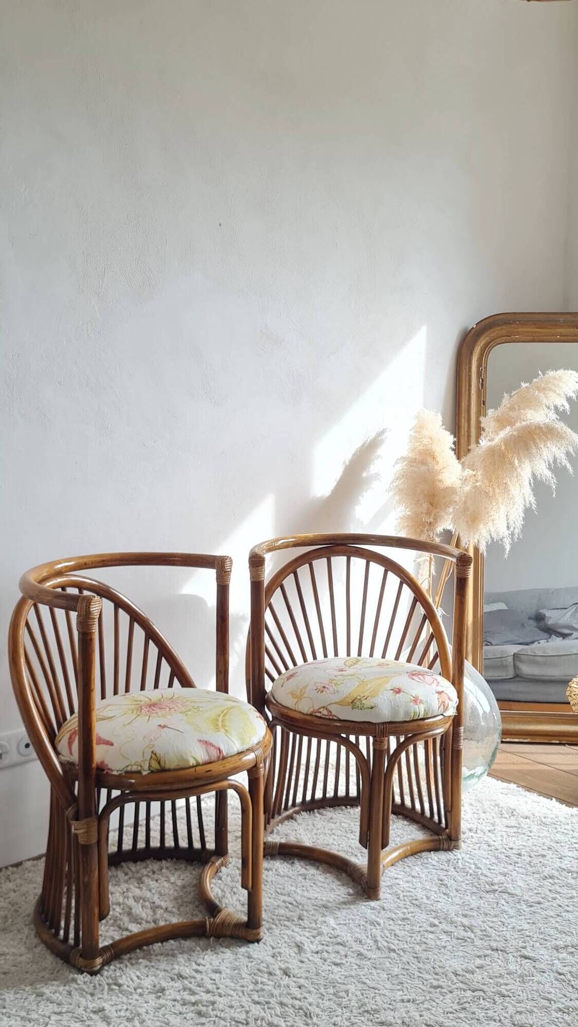 Pair of vintage rattan armchairs circa the 1960s.