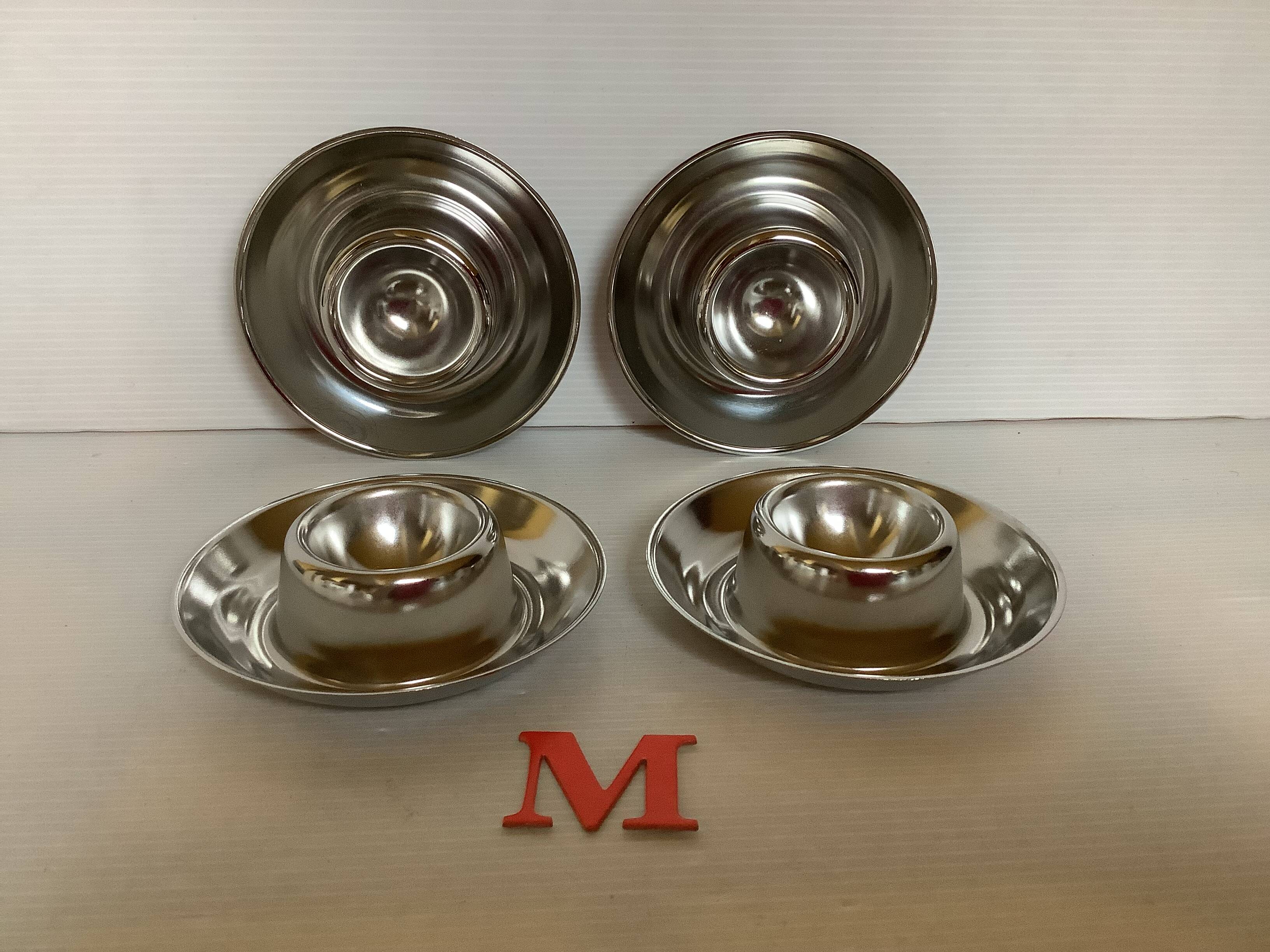 Four Belgium M stainless steel egg cups