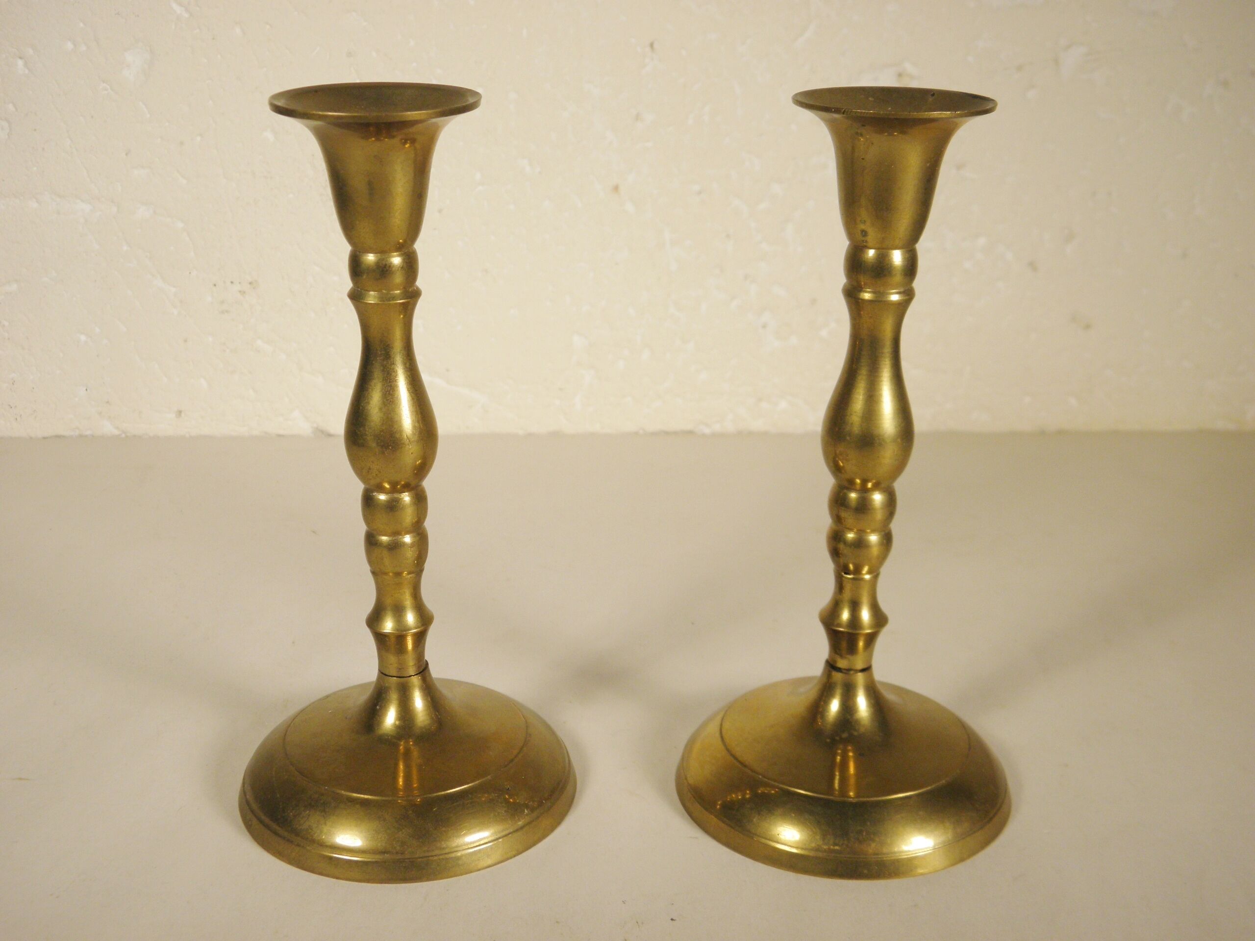 Pair of brass candle holders