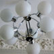 Mid century chandelier with 9 radiating milk glass globes 1970s