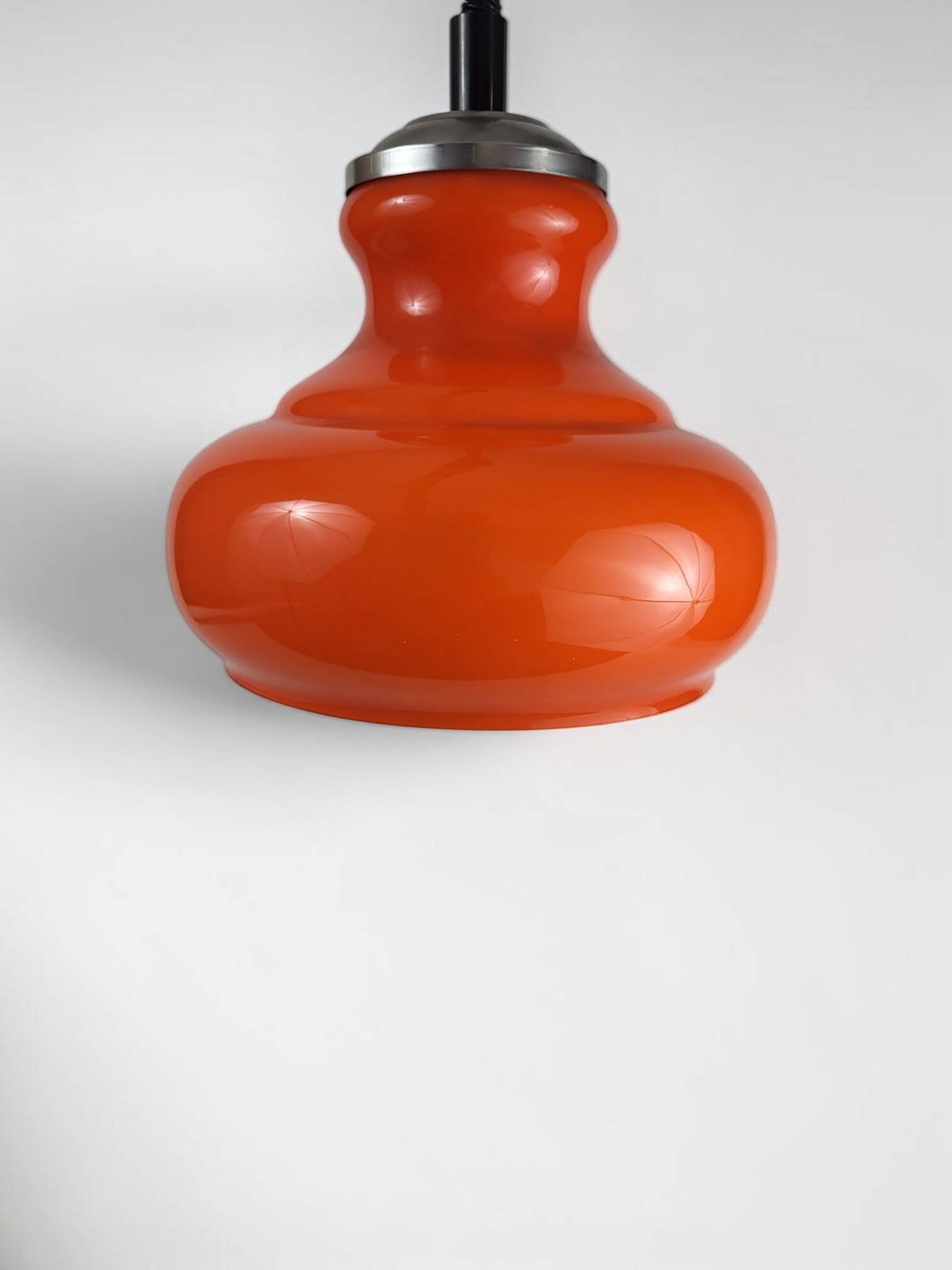 Orange glass pendant light.
