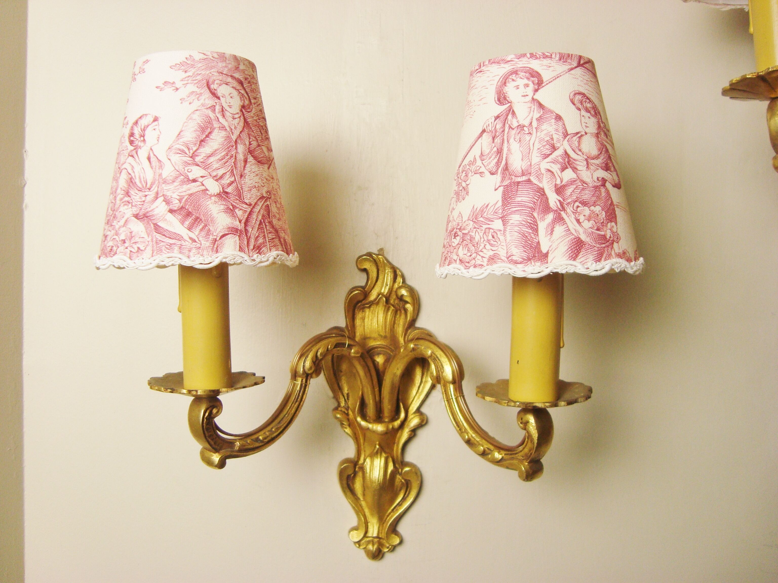 Pair of bronze sconces with four handmade toile de Jouy lampshades in France