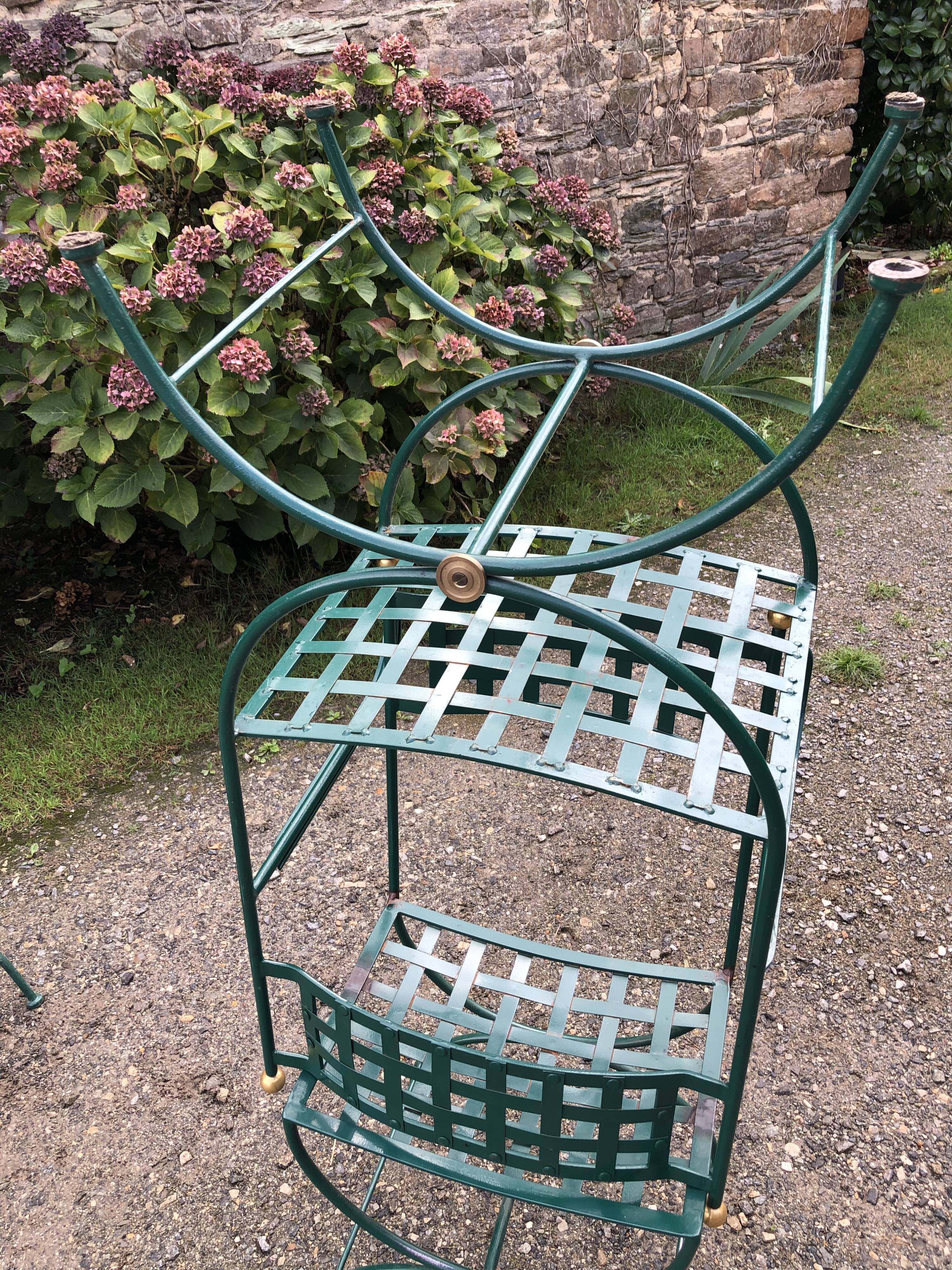 2 armchairs and 2 chairs in full wrought iron, handcrafted.