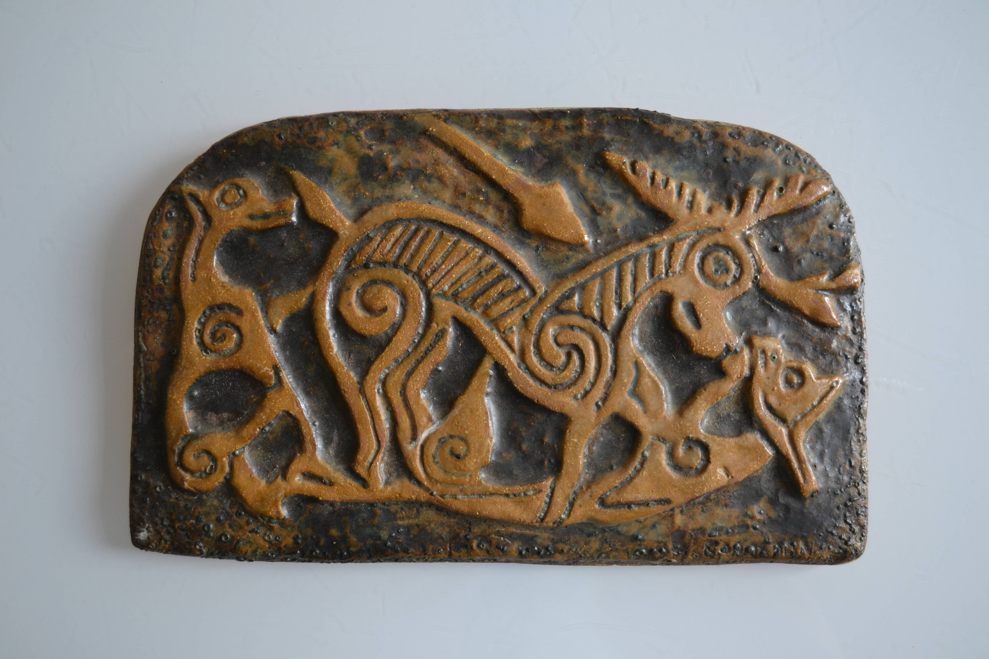 Bas-relief sculpture in terracotta inspired by the Celtic bestiary