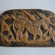 Bas-relief sculpture in terracotta inspired by the Celtic bestiary