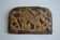 Sculpture en bas relief en terre cuite d'inspiration du bestiaire celtique