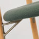 Kusch &Co chair made of wood and green fabric