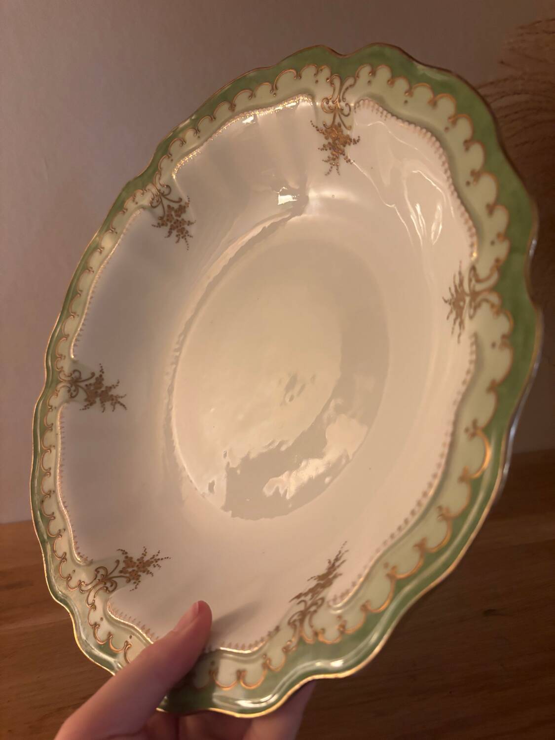Green Limoges porcelain serving dish with gilt trim