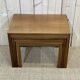 Suite of 3 teak pull-out tables from the 70s