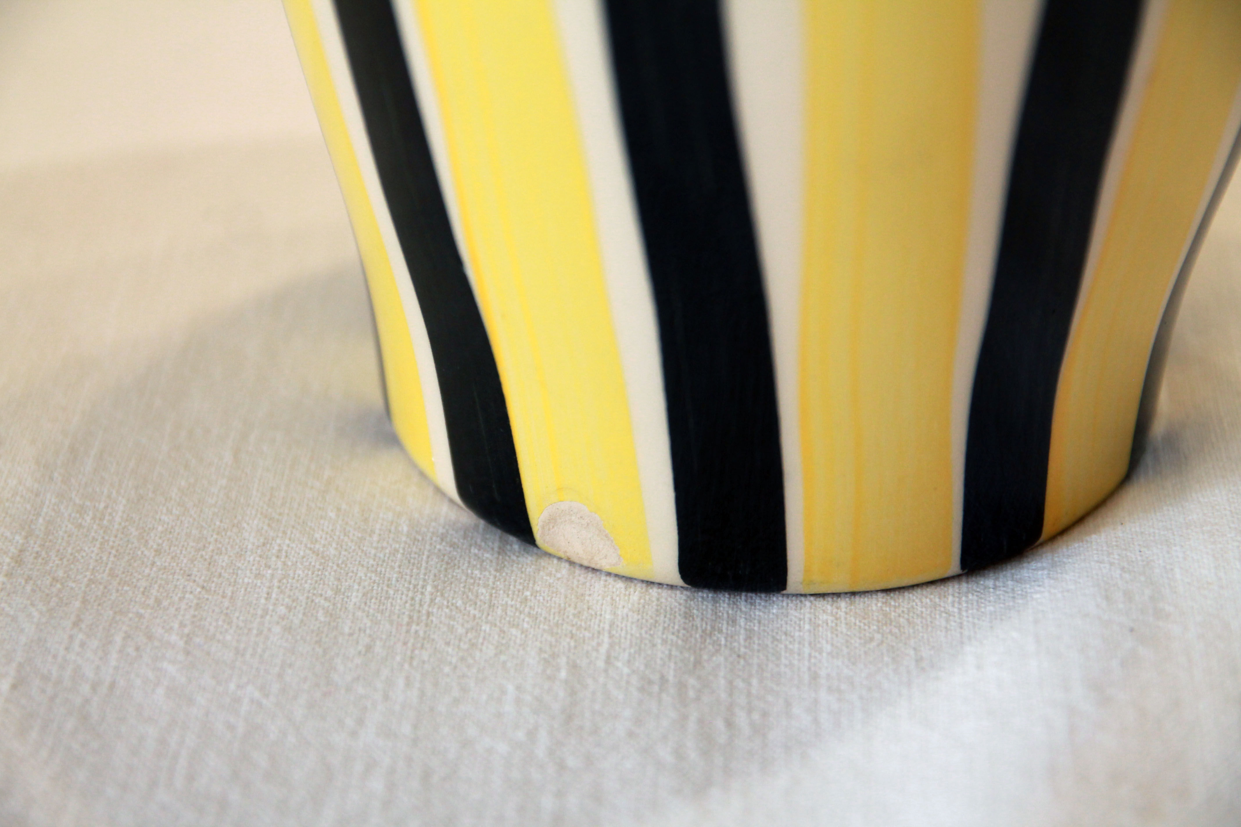 Yellow and black ceramic vase