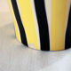 Yellow and black ceramic vase