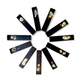 Set of 11 blackened resin knife holders, 1970s