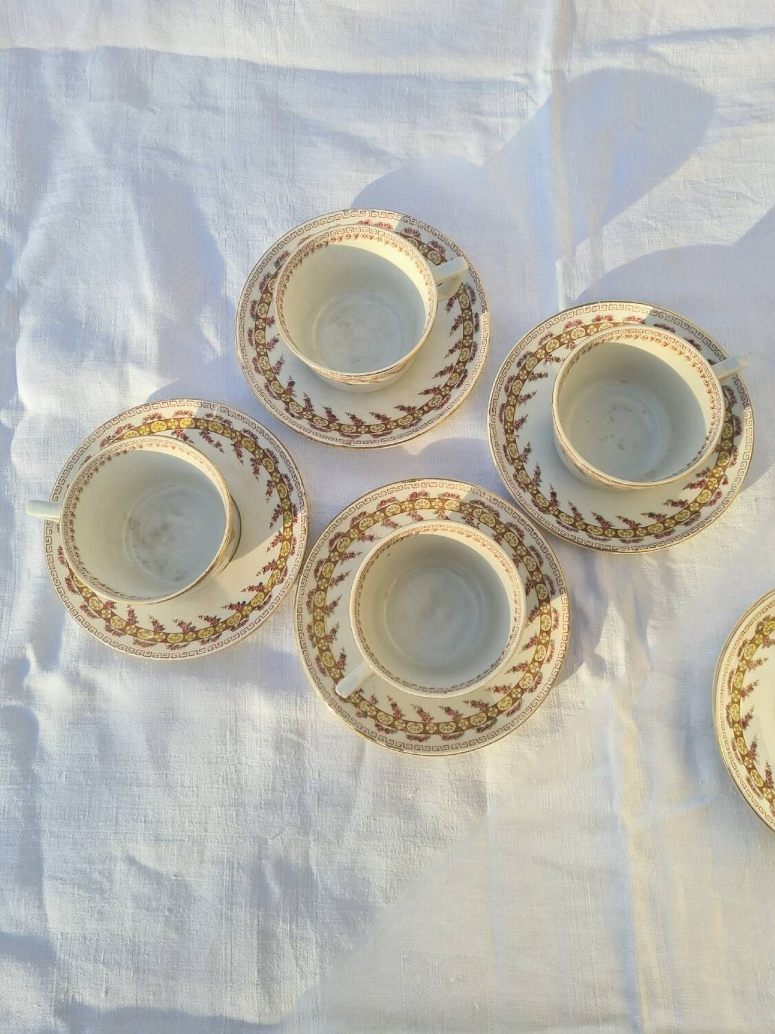 Gien opaque porcelain cups from the early 20th century