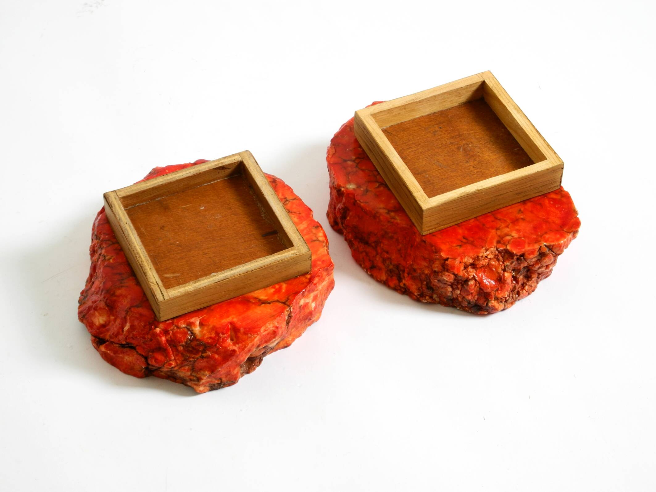 Two mid-century standing ashtrays consisting of red Alabaster cup