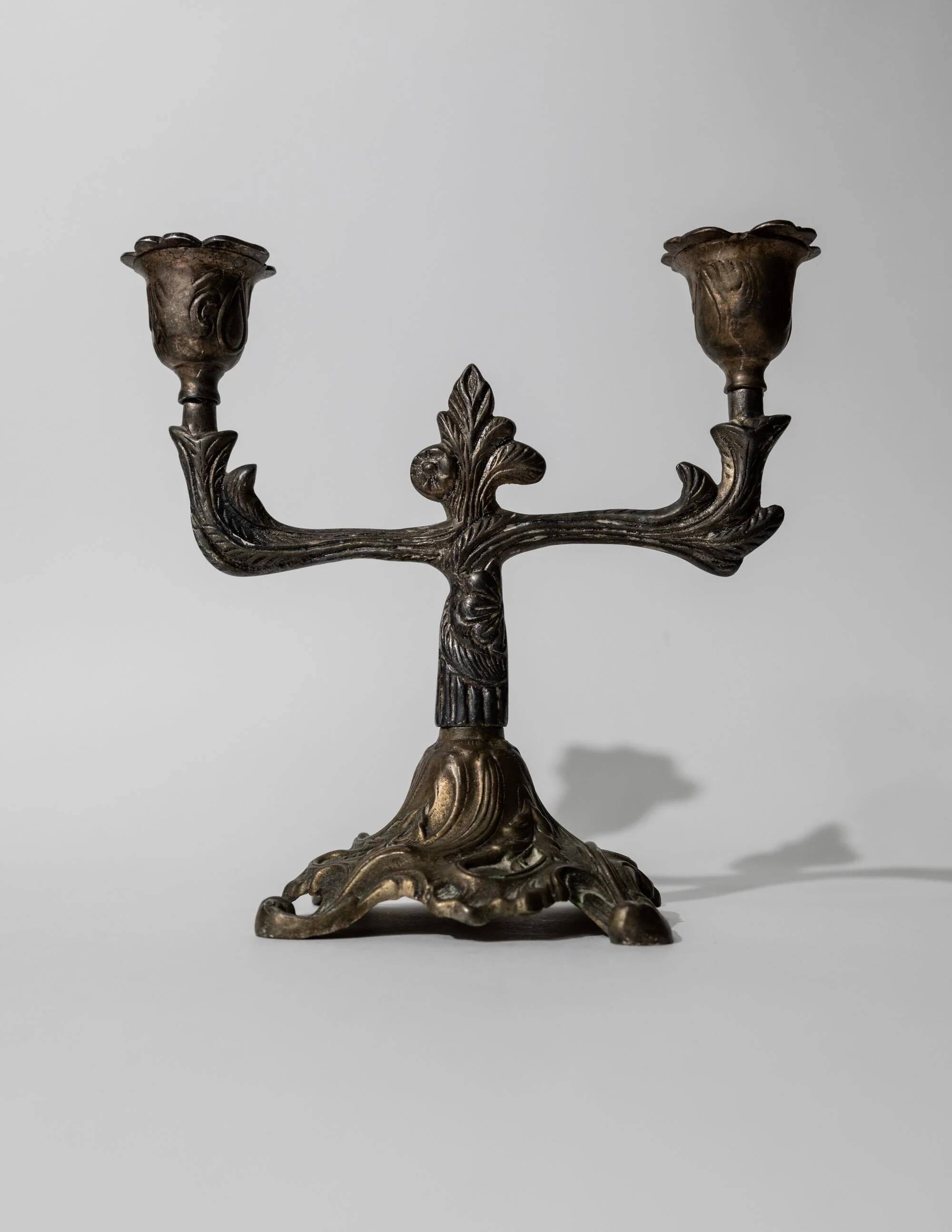 Vintage bronze candlestick for two candles, 1910s, Art Deco design.