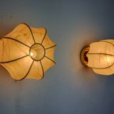 Pair of “cocoon” wall lights, resin and pine, italy, 1970