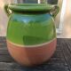 Mediterranean pot in green half-glazed terracotta.