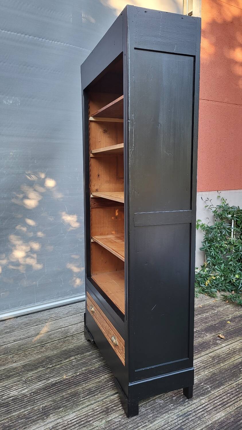 Two-tone black and honey bookcase