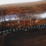 Cognac-colored vintage sheep leather wingback chair with character