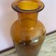 Amber glass vase bottle