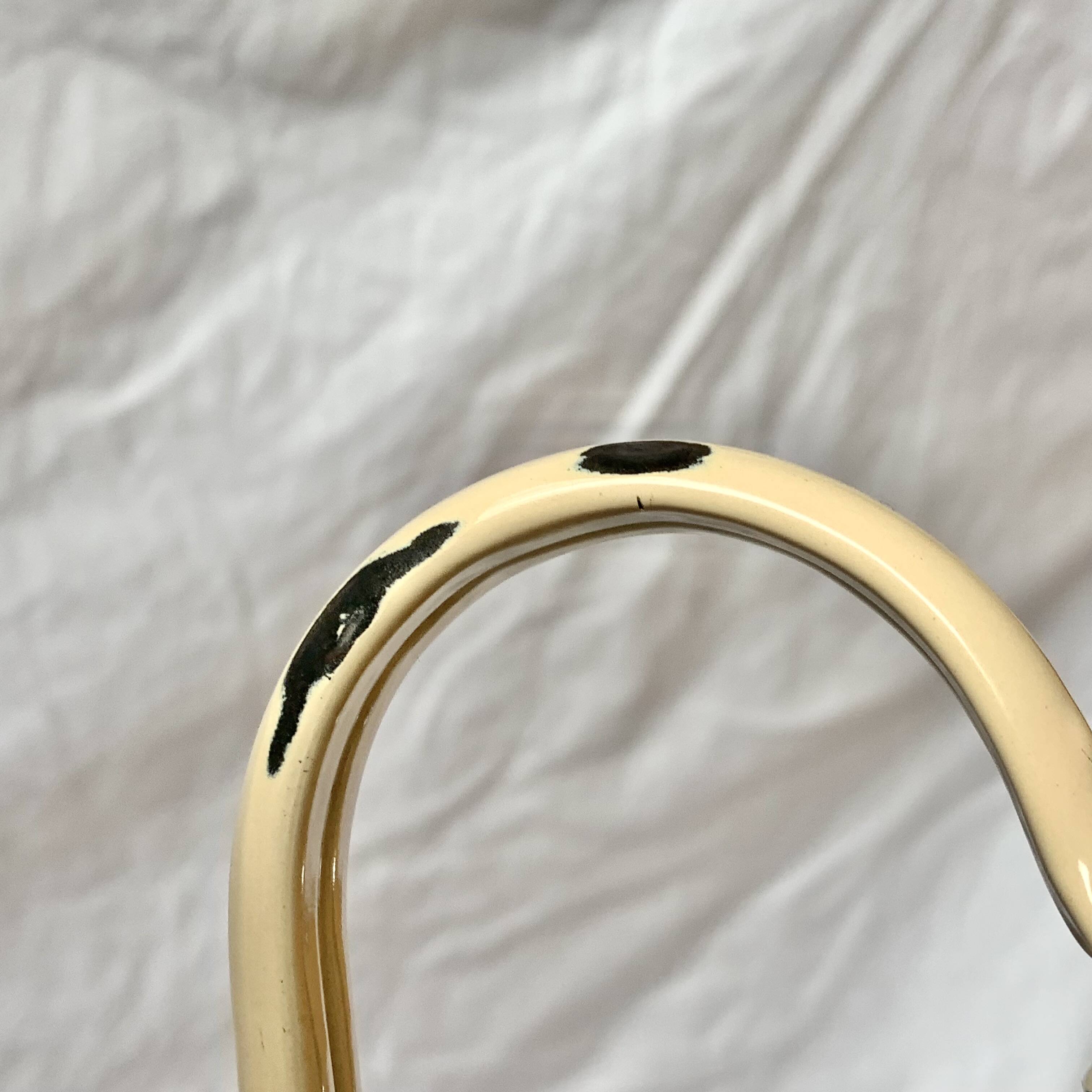 Vintage pitcher or jug in beige enamelled sheet metal