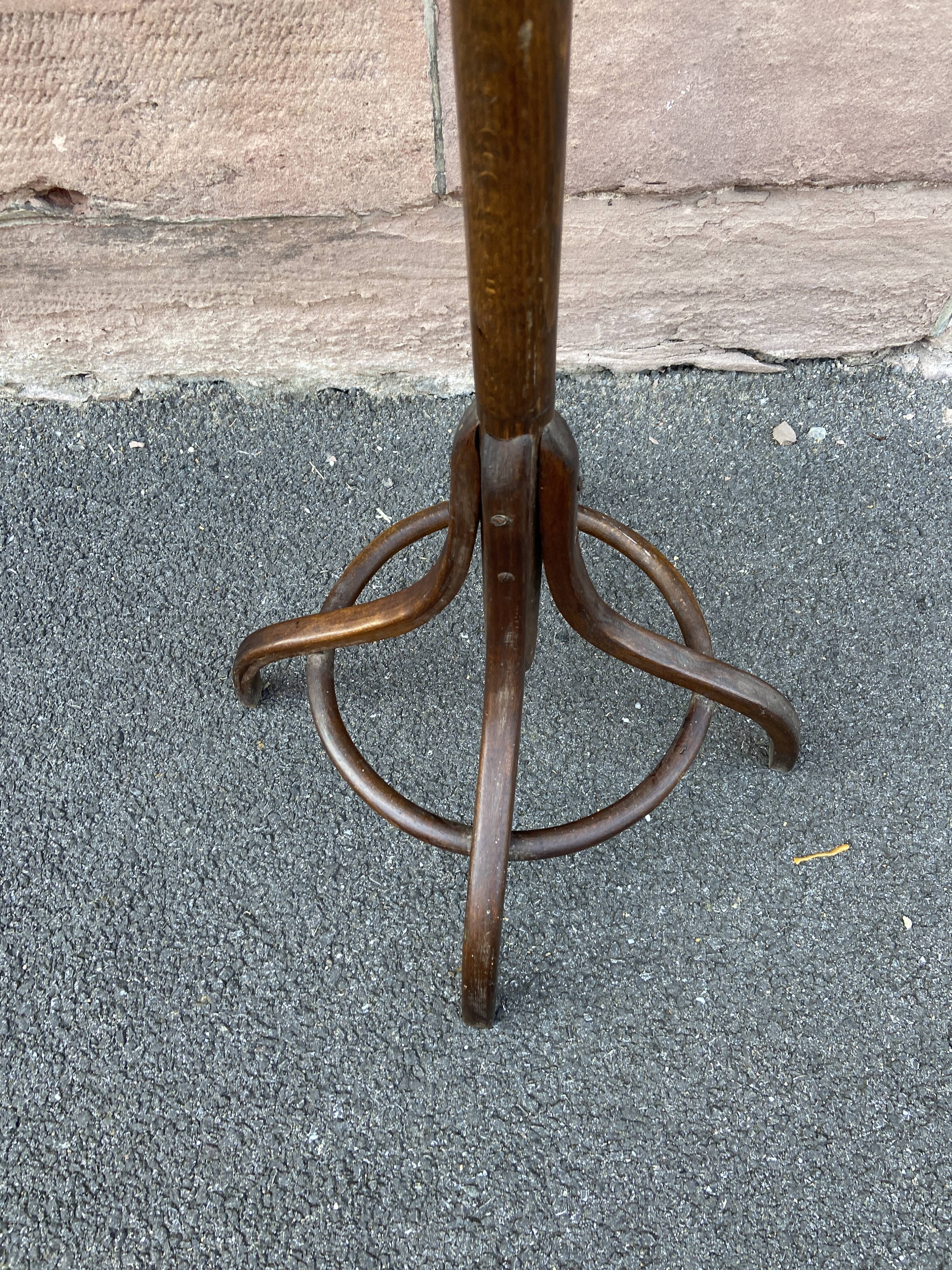 Baumann coat rack on vintage parrot stand
