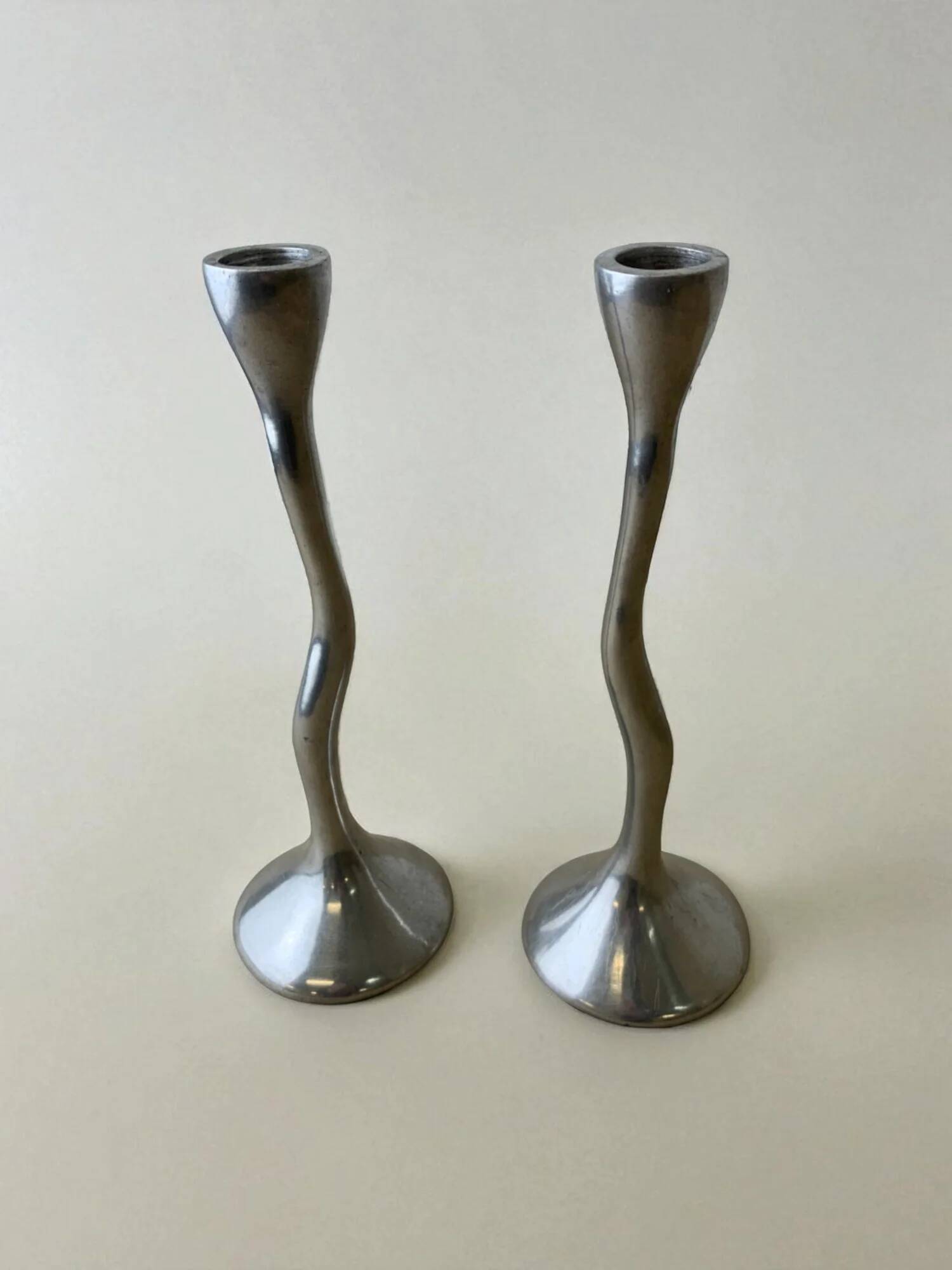 Pair of zigzag candlesticks, solid aluminium, Spain, circa 1980s