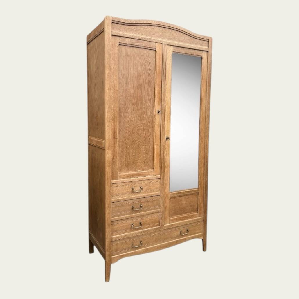 Parisian hotel wardrobe with bevelled mirror, solid raw oak, 1920.