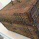 Braided wicker malle