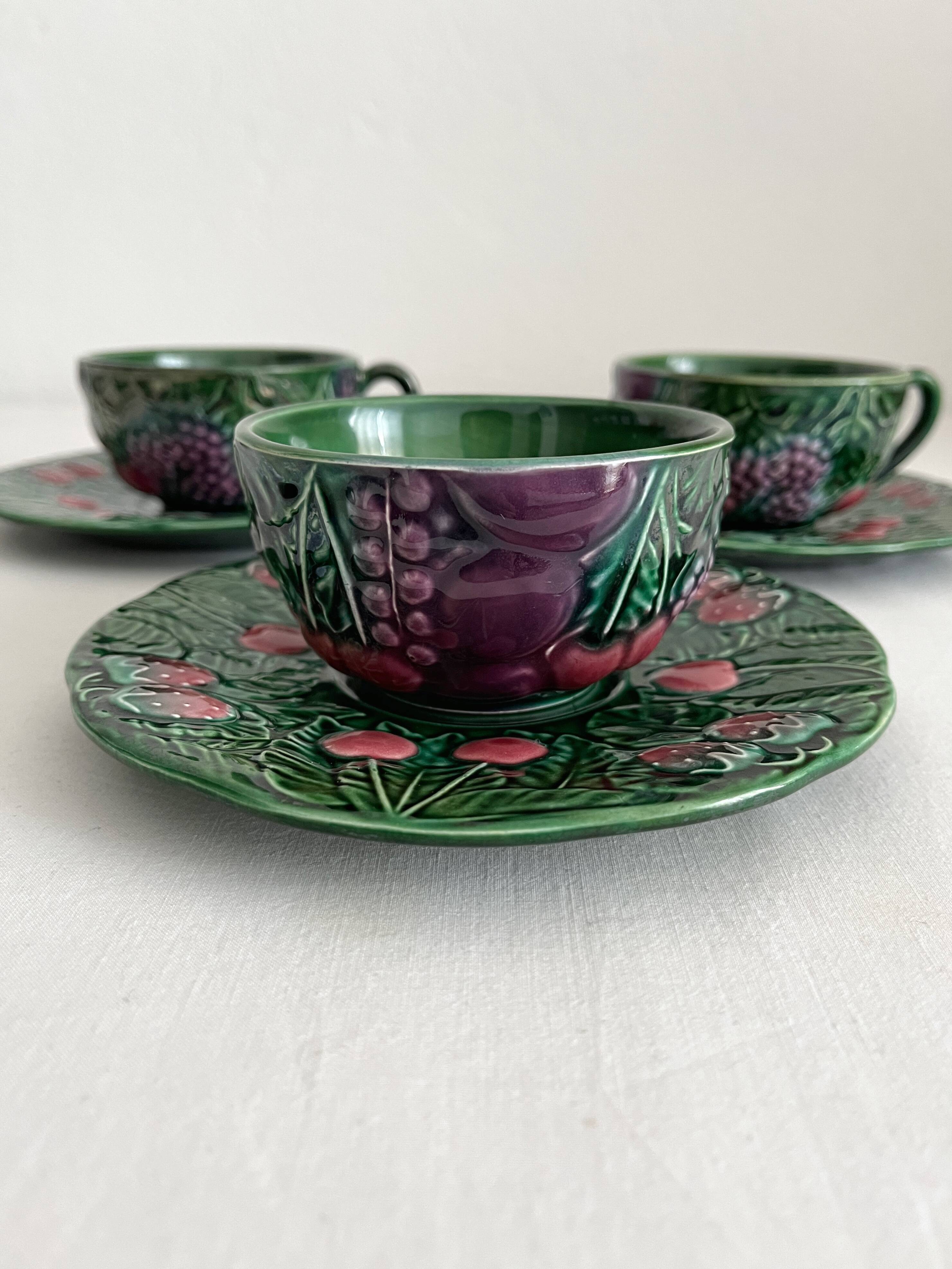 3 earthenware cups and saucers in barbotine fruit decor Salins vintage