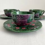 3 earthenware cups and saucers in barbotine fruit decor Salins vintage