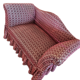 Two-seater sofa on wheels