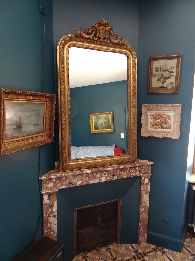 Mirror XIXth in gilded stucco, H 142 cm