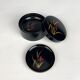 Coasters and their vintage black lacquered wooden box