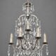 Rococo-style chandelier with 9 light arms.