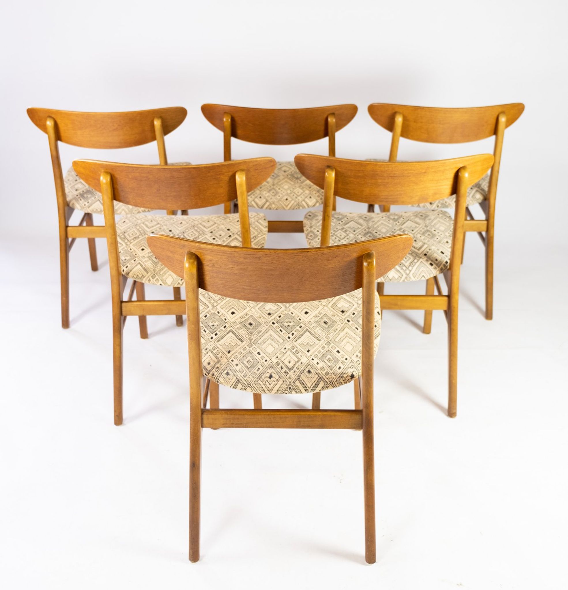 Set of six dining room chairs in teak and upholstered with light fabric, of danish design, 1960S