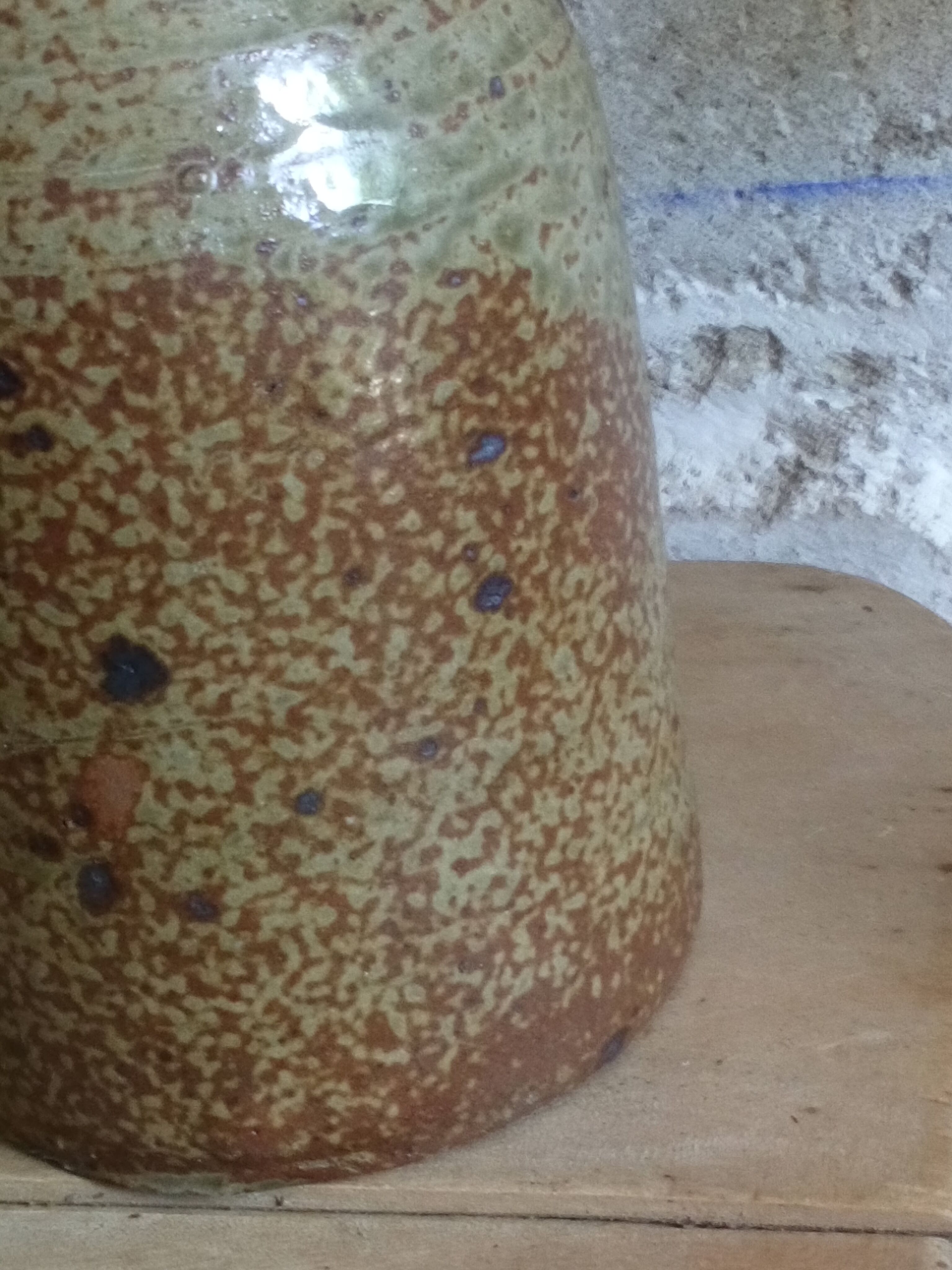 Bottled sandstone vase with a narrow neck