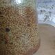 Bottled sandstone vase with a narrow neck