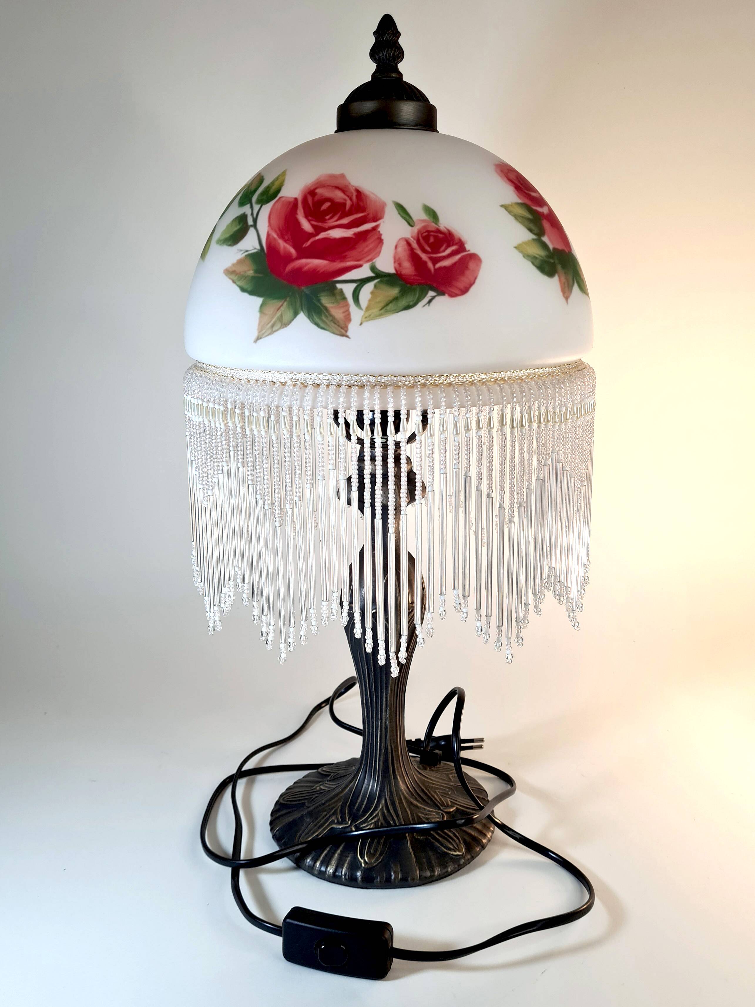 Vintage Tiffany-style fringed lamp with floral globe