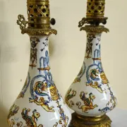 Gien: pair of antique oil lamps in fine earthenware richly decorated.