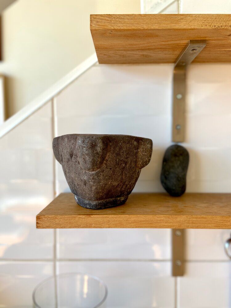 Mortar and pestle in black stone