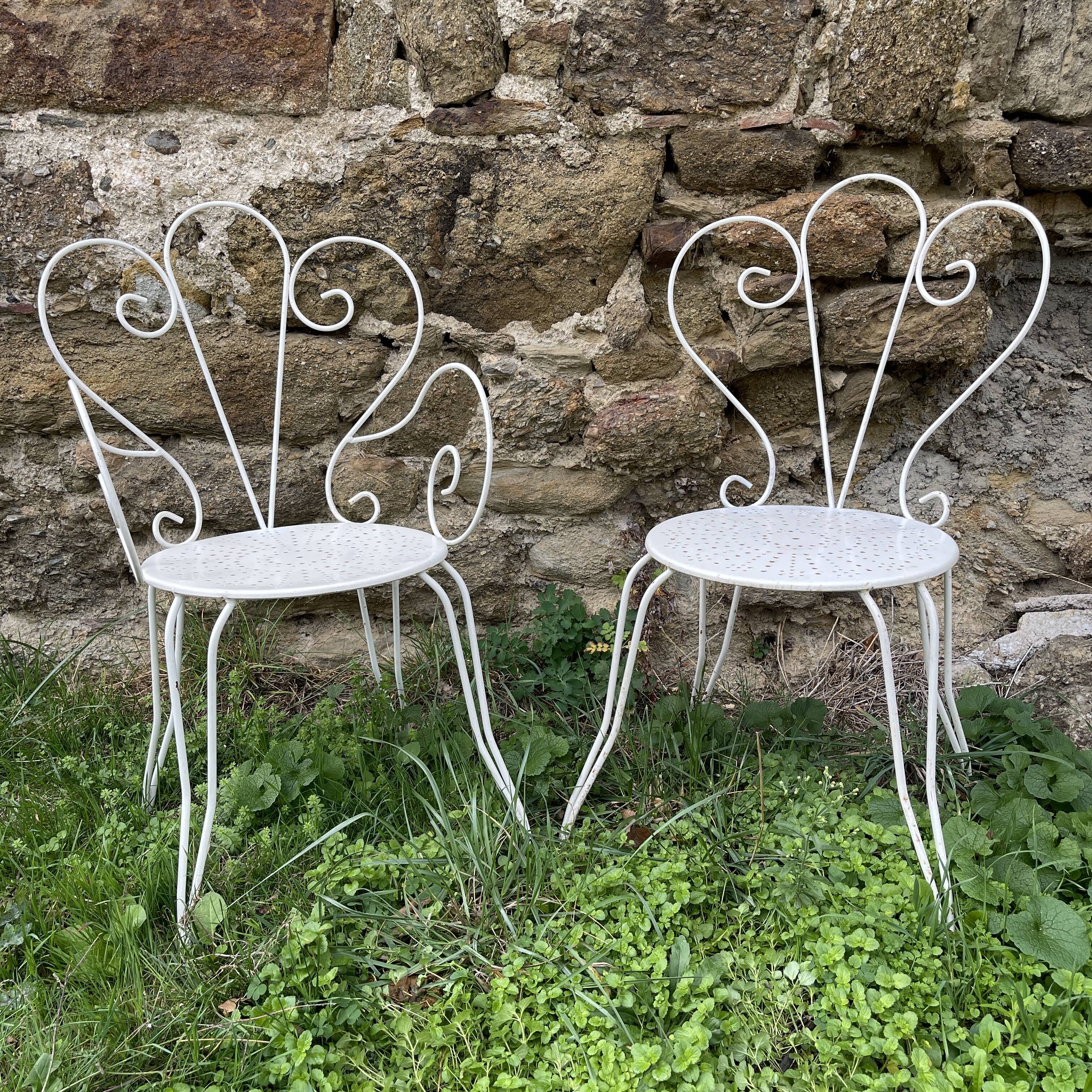 Armchair and garden chair in wrought iron