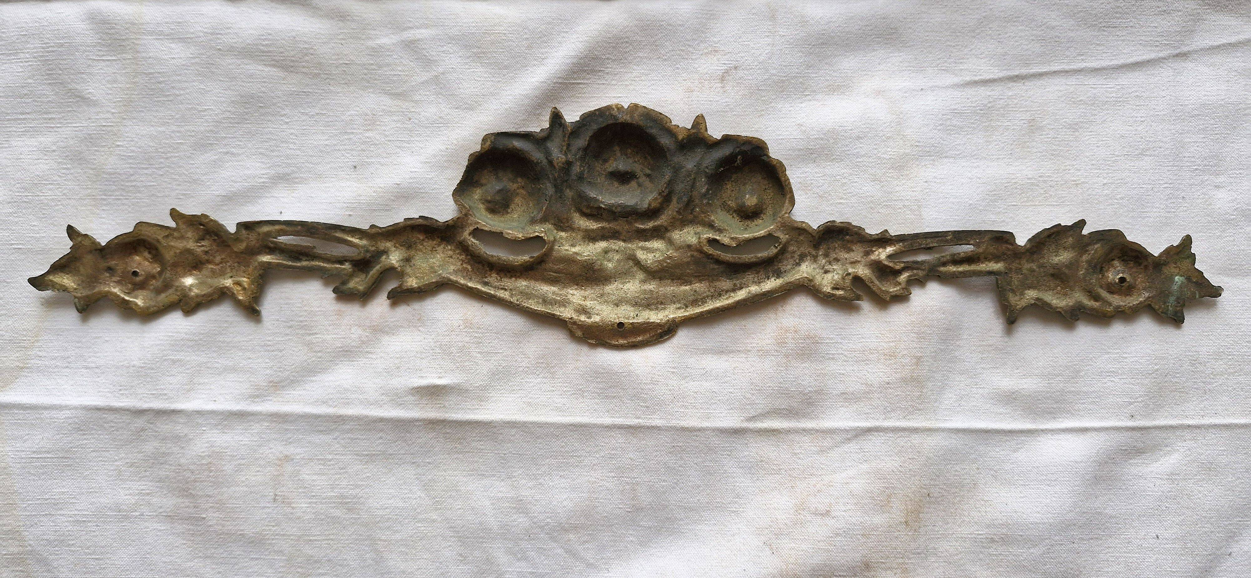 Old brass rose window, width 38cm.